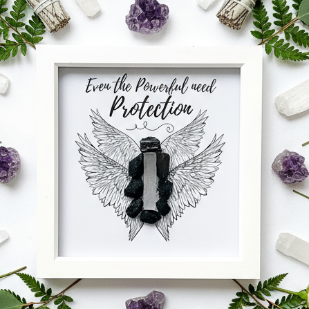Black Tourmaline and Selenite frame flat lay with protection crystal pattern
