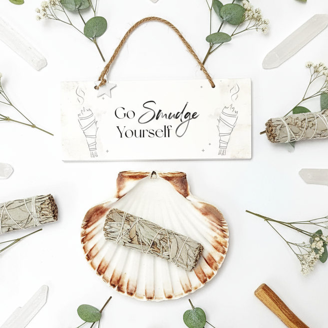 Go Smudge Yourself kit flat lay with spiritual pattern